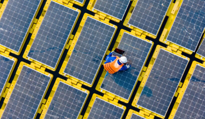 Aerial view floating solar cell power plant with solar cell generate the electric on the lake, Floating solar panels and cell platform on the water ecological energy, Alternative renewable energy.