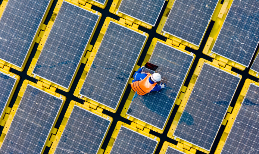 Aerial view floating solar cell power plant with solar cell generate the electric on the lake, Floating solar panels and cell platform on the water ecological energy, Alternative renewable energy.